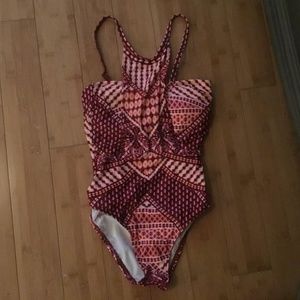 NWT Kenneth Cole swimsuit, Very unique style and color.  It has tummy control!!!